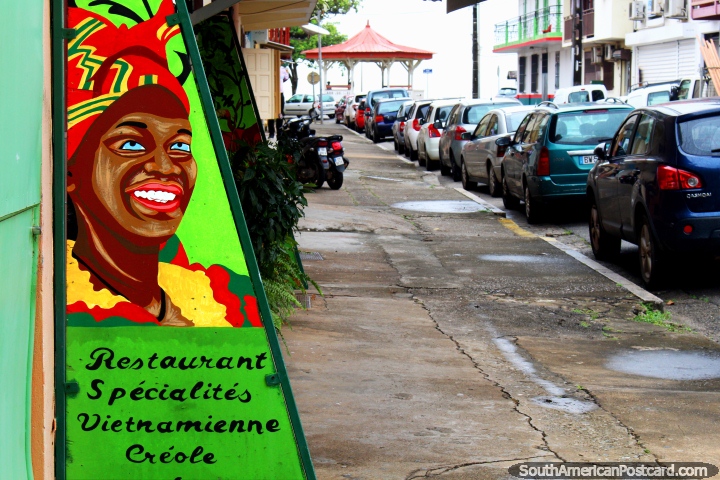 Sign for a restaurant specializing in Vietnamese creole cuisine in Cayenne, French Guiana. (720x480px). The 3 Guianas, South America.