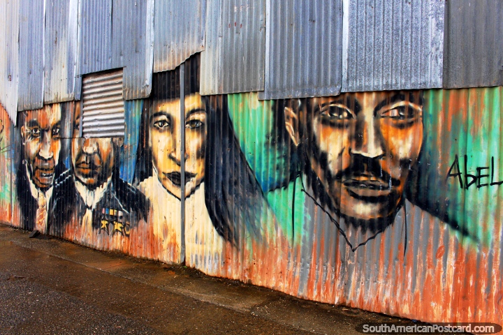 A mural of 4 figures on corrugated iron in Cayenne, French Guiana.  (720x480px). The 3 Guianas, South America.
