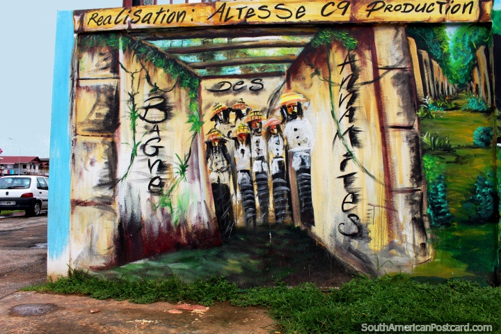A nice mural of indigenous people with hats in Cayenne, French Guiana. (720x480px). The 3 Guianas, South America.