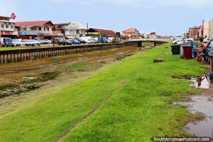 The river separating Avenue de la Liberte and Village Chinois in Cayenne, French Guiana. (720x480px). The 3 Guianas, South America.