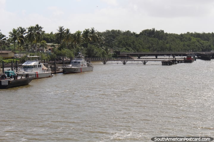 The Kourou River with boats and jungle in French Guiana. (720x480px). The 3 Guianas, South America.
