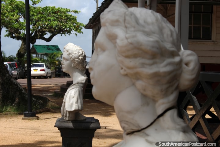 A pair of white busts near the river in Paramaribo, Suriname. (720x480px). The 3 Guianas, South America.