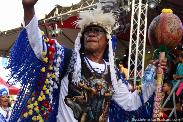 An indigenous man in full outfit at the Avondvierdaagse parade in Paramaribo, Suriname. (720x480px). The 3 Guianas, South America.