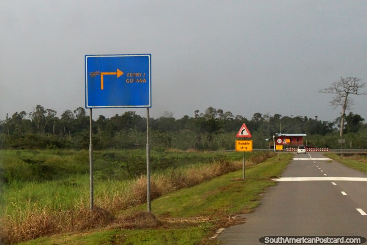 The intersection to turn right to go to the ferry to Guyana, near South Drain in Suriname. (720x480px). The 3 Guianas, South America.