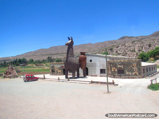 Huge llama monument beside the road south of Humahuaca. (640x480px). Argentina, South America.
