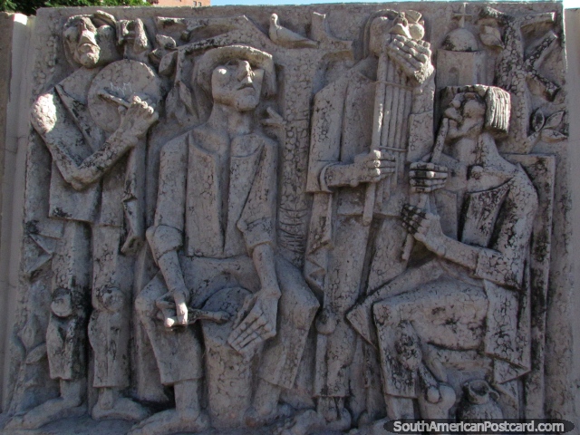 A sculpture of a native band at Plaza Espana in Cordoba created by local artists. (640x480px). Argentina, South America.