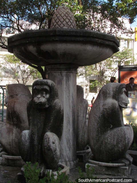 A 4 monkey stone fountain on a street corner in Cordoba. (480x640px). Argentina, South America.