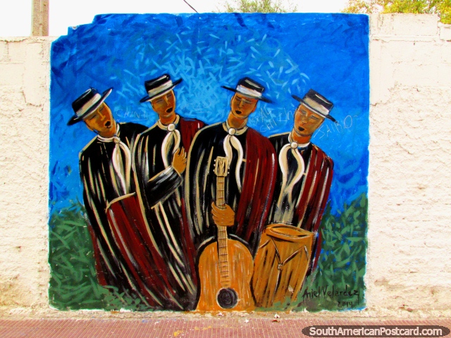 4 well-dressed musicians in hats sing a song, wall mural in Cafayate. (640x480px). Argentina, South America.