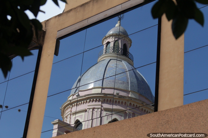 The dome of the Salta Cathedral, reflection in the windows of a nearby building. (720x480px). Argentina, South America.