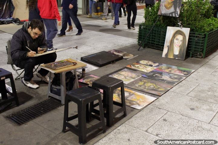 An artist draws pastel colored drawings in Buenos Aires. (720x480px). Argentina, South America.