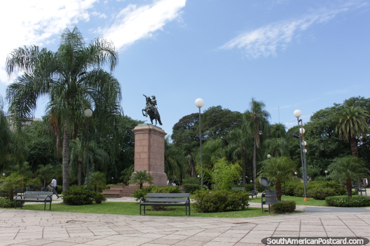 The central part of Plaza 25 de Mayo with monument and palm trees in Resistencia. (720x480px). Argentina, South America.
