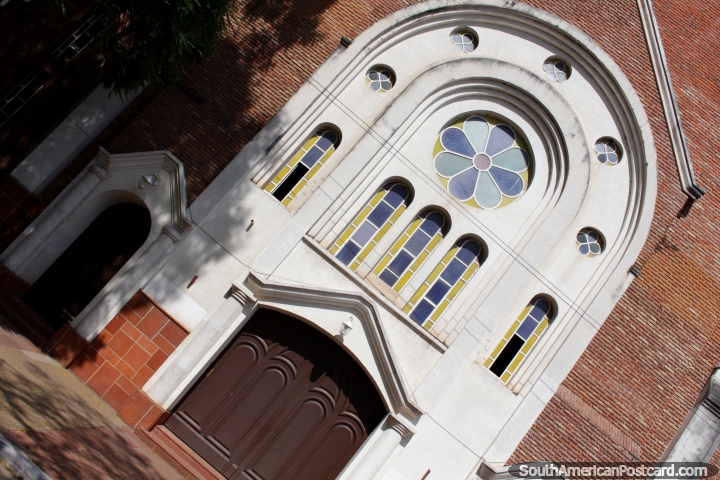 The arched facade and windows of Parroquia Maria Auxiliadora in Resistencia. (720x480px). Argentina, South America.