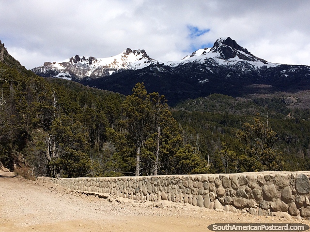 A beautiful landscape during the drive along Route 65 to Traful with snow-capped mountains and forest. (640x480px). Argentina, South America.