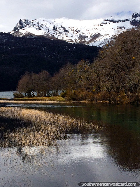 Amazing scene of snowy mountains, lake and bushes near Villa La Angostura. (480x640px). Argentina, South America.
