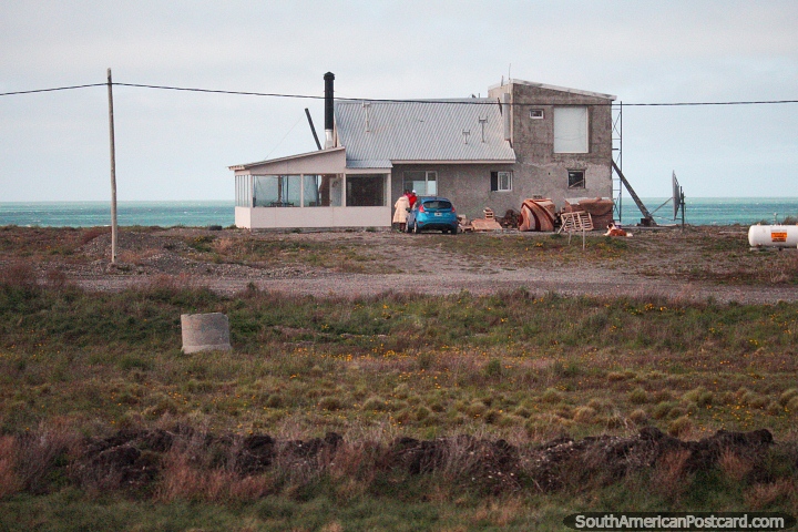 House by the sea in the Tierra del Fuego between San Sebastian and Rio Grande. (720x480px). Argentina, South America.