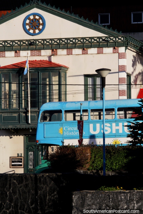 End of the World Museum and a blue double-decker bus in Ushuaia. (480x720px). Argentina, South America.