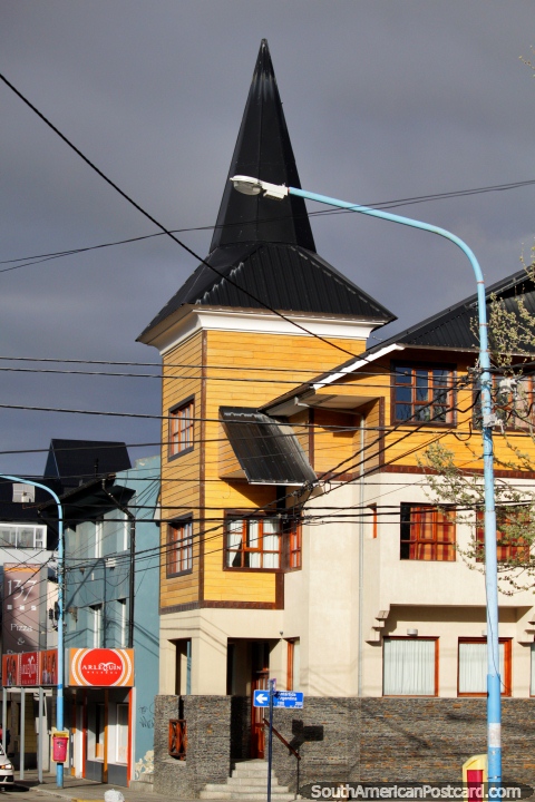 Buildings with pointed roofs and towers are not necessarily churches in Ushuaia. (480x720px). Argentina, South America.