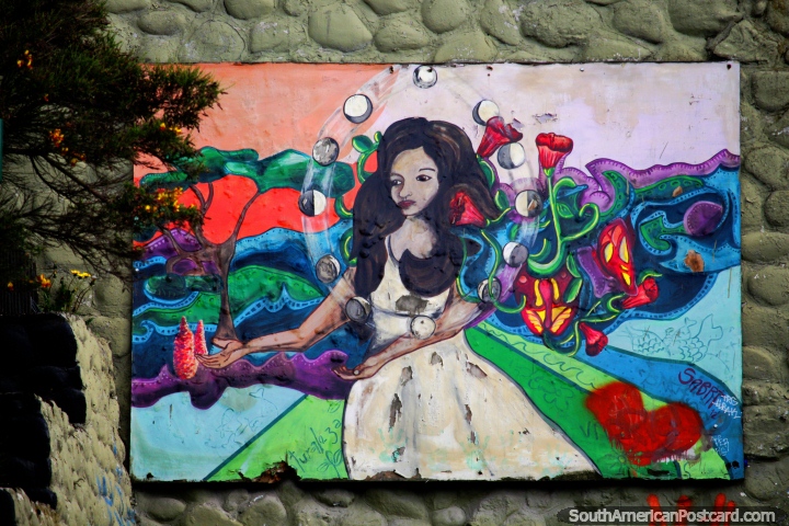 Una mujer entre flores, arte callejero en Ushuaia. (720x480px). Argentina, Sudamerica.