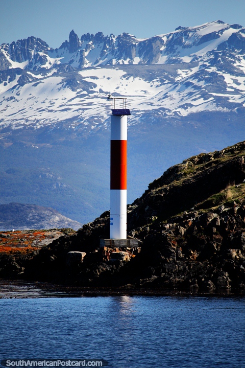 One of the red and white lighthouses seen on the Bird Island Tour in Ushuaia. (480x720px). Argentina, South America.