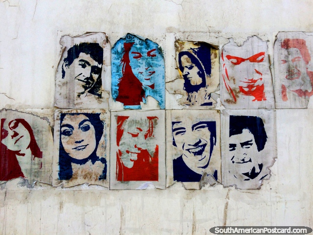 10 faces on pieces of paper stuck on a wall in Ushuaia, this makes great art! (640x480px). Argentina, South America.
