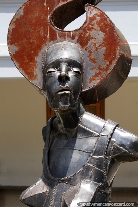 Sculpture of metal by Luciano Carbajo in Cordoba, a woman with head-wear. (480x720px). Argentina, South America.