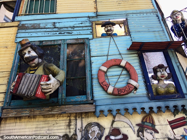 La Boca, the old part, characters looking out windows down to the street in Buenos Aires. (640x480px). Argentina, South America.