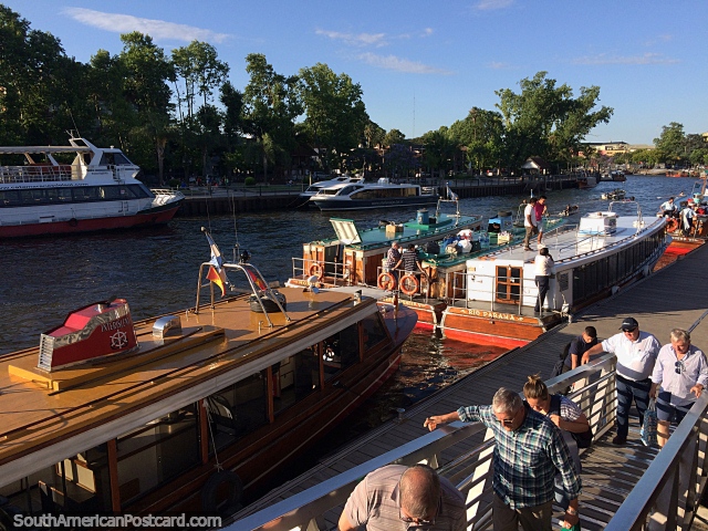 Passenger boats bring people back to town at the end of the day in Tigre, Buenos Aires. (640x480px). Argentina, South America.