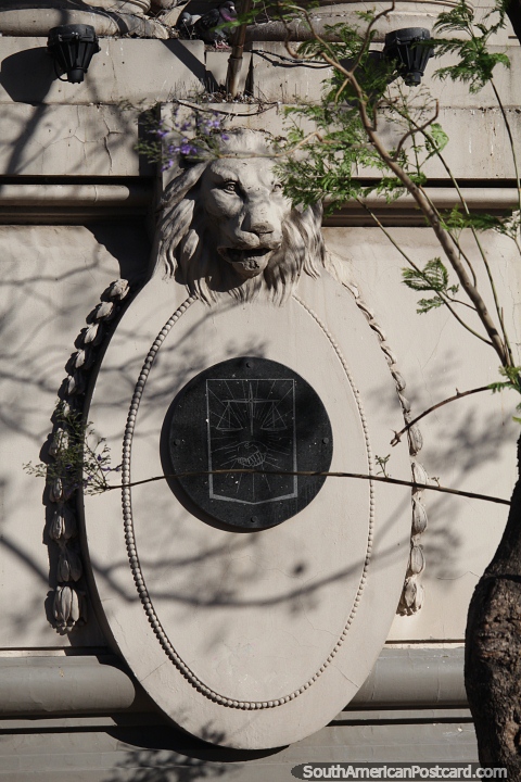 Stone facade featuring a lion's head in Bahia Blanca. (480x720px). Argentina, South America.