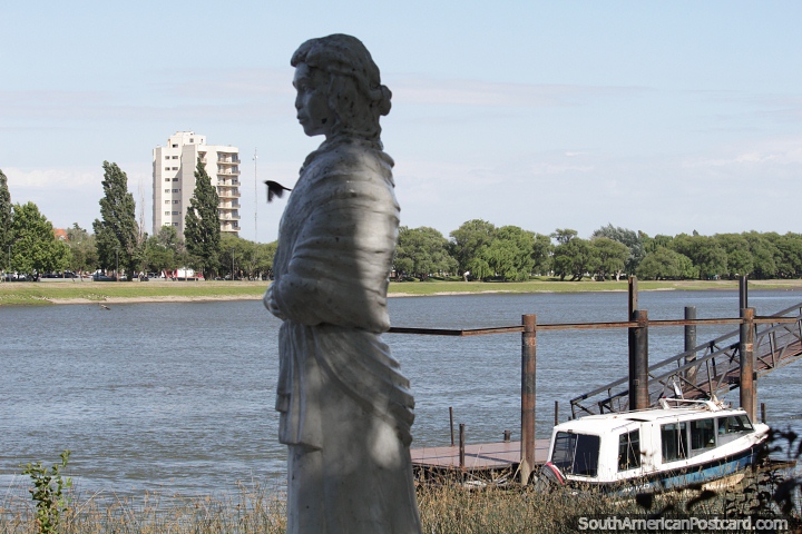 White statue of a woman in Patagones, view to the river across to Viedma. (720x480px). Argentina, South America.