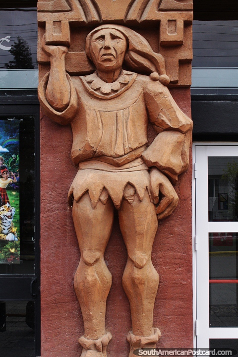 Man dressed in theatrical clothing, ceramic work, facade of the theater in Piedrabuena. (480x720px). Argentina, South America.