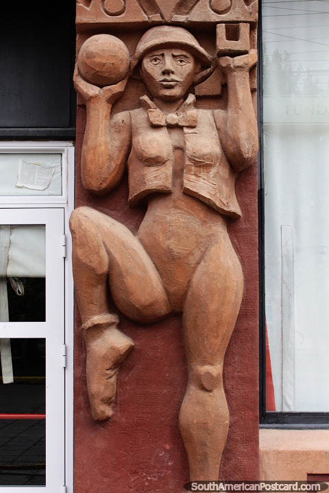 Dancer holds a ball, ceramic facade of the theater in Piedrabuena. (480x720px). Argentina, South America.