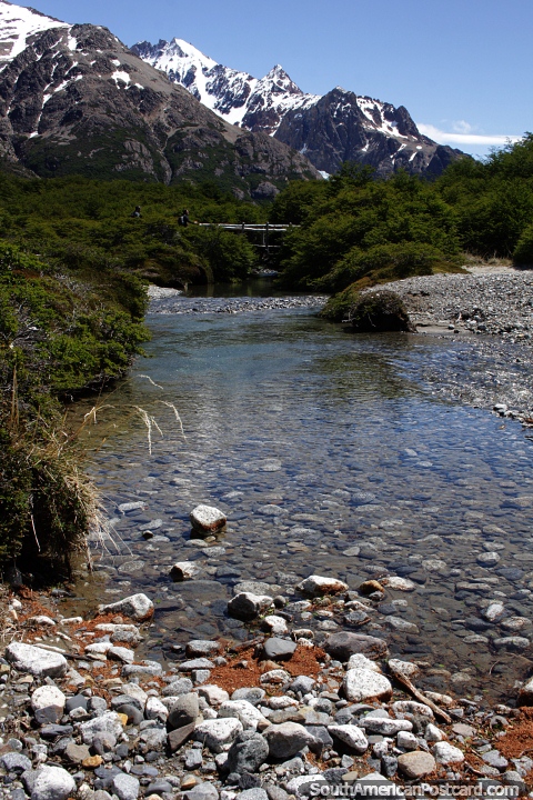 The river and bridge are at the 7km mark on the Fitz Roy trail in El Chalten. (480x720px). Argentina, South America.