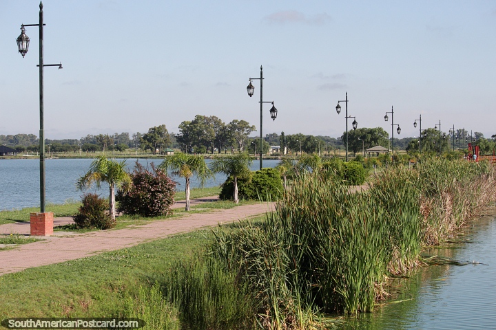 Walking path separating 2 parts of the lagoon in Santa Rosa. (720x480px). Argentina, South America.
