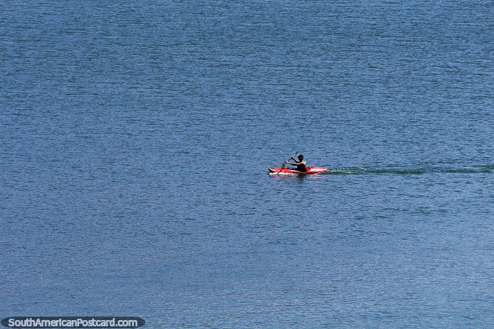 Single-person kayak in big waters at Valle Grande Reservoir, canyon Atuel, San Rafael. (720x480px). Argentina, South America.