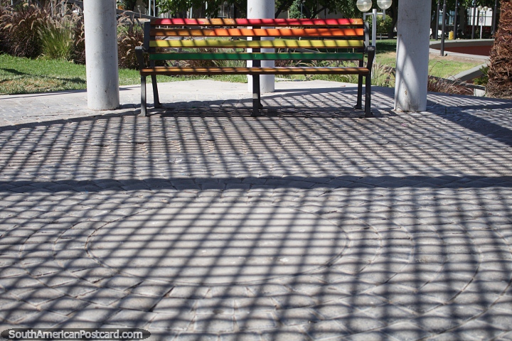 Colored chair and shadows of the roof at the Spanish plaza in San Juan. (720x480px). Argentina, South America.