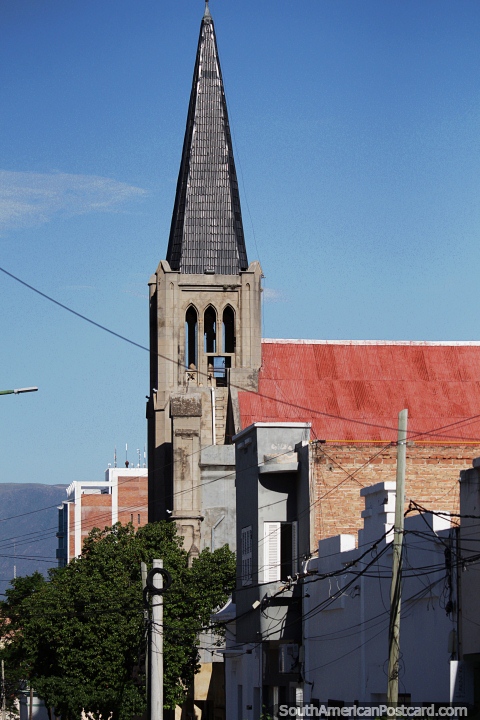Tall church steeple on a street in Catamarca. (480x720px). Argentina, South America.