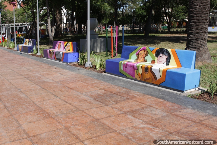Popular figures depicted on the seats in the plaza in Resistencia. (720x480px). Argentina, South America.