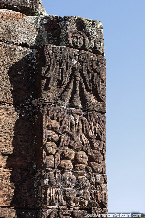 Intertwined figures and faces of the ancient 17th / 18th century Guarani Jesuit ruins in San Ignacio. (480x720px). Argentina, South America.