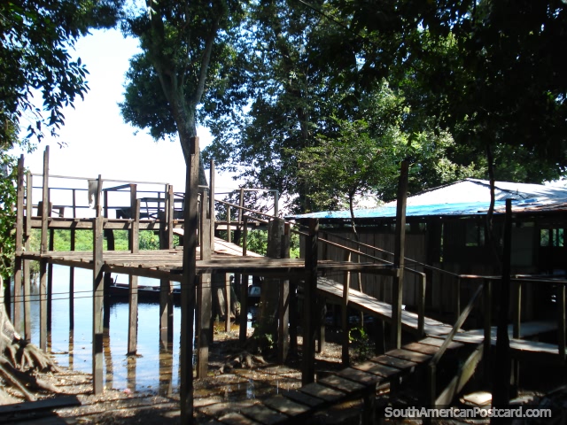 Pampas style accommodation in the wetlands with bridges and walkways. (640x480px). Bolivia, South America.