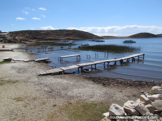 Jetty's and boats in the bay at Island of the Sun. (640x480px). Bolivia, South America.
