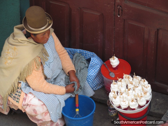 Woman sells lemon cream jelly in La Paz street. (640x480px). Bolivia, South America.