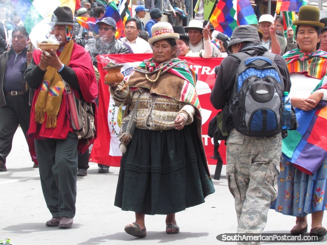 People carrying sacred burning pots in La Paz. (640x480px). Bolivia, South America.