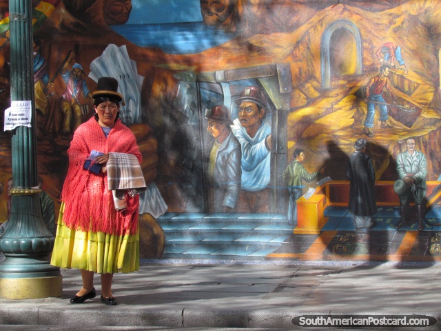 Senhora de chapu em vermelho e amarelo e mural de parede em La Paz. (640x480px). Bolvia, Amrica do Sul.