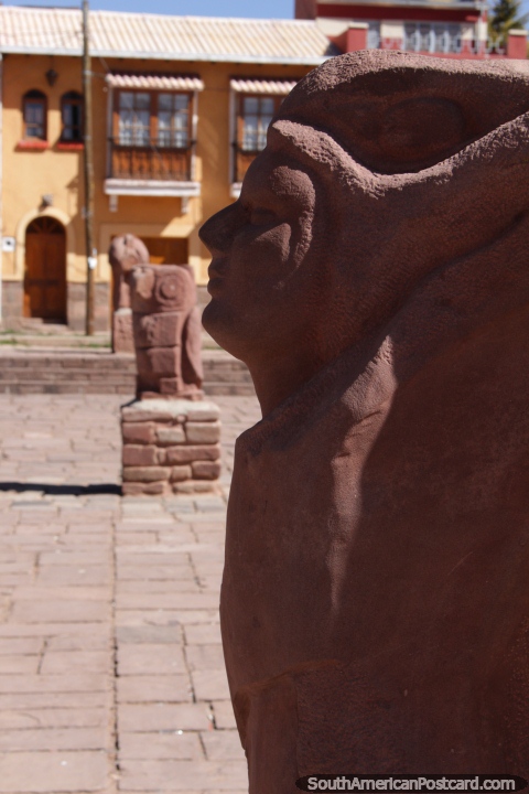 Many sculptures of rock are displayed in the plaza in Tiwanaku. (480x720px). Bolivia, South America.