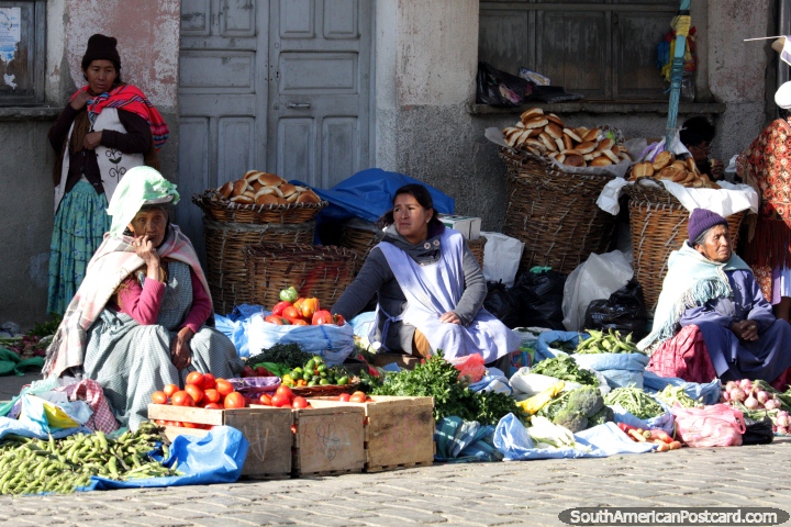 Vegetables and baskets of bread for sale at Mercado Rodriguez in La Paz. (720x480px). Bolivia, South America.