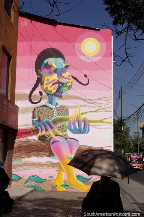 A very colorful mural with pink sky and an interesting character in Cochabamba. (480x720px). Bolivia, South America.