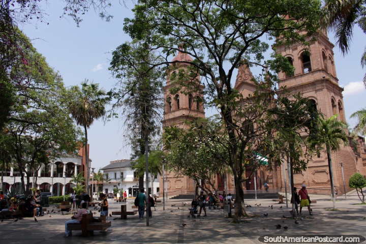 The beautiful central plaza in Santa Cruz with the brick cathedral behind trees. (720x480px). Bolivia, South America.