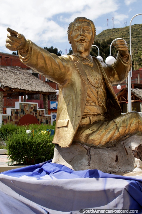 Gold monument of Don Eduardo Abaroa (1838-1879) pointing out to the Tiquina Strait between Copacabana and La Paz, a war hero. (480x720px). Bolivia, South America.