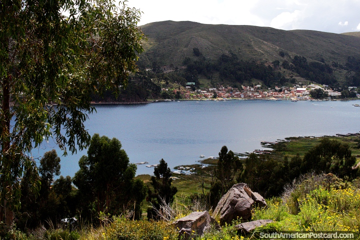 San Pedro de Tiquina in the distance after crossing the strait to San Pablo de Tiquina. (720x480px). Bolivia, South America.