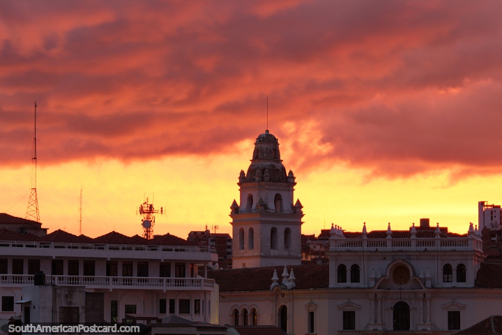 6am in Sucre and the sun begins to rise, orange skyline, university in the foreground. (720x480px). Bolivia, South America.